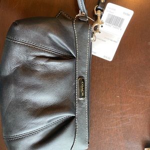 Black coach clutch, never used